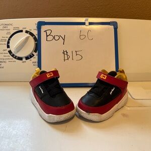 Jordan Kids Red, Black, and Yellow Sneakers